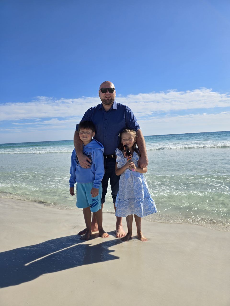 Alex Antonov with his kids, founder of Build With Grace, Gulf Breeze FL